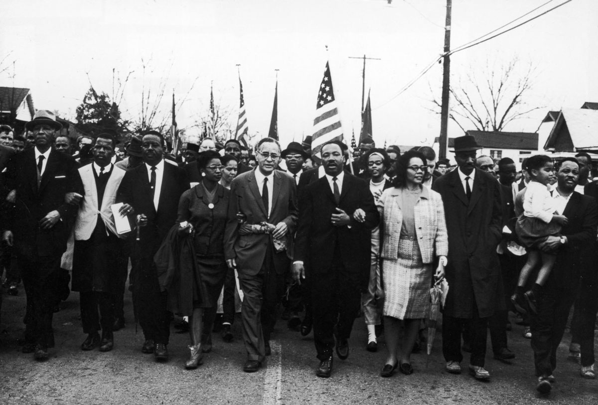 March 28, 1965 - Martin Luther King and 25,000 civil rights protestors end a five-day march at the steps of the state capital of Montgomery in Alabama