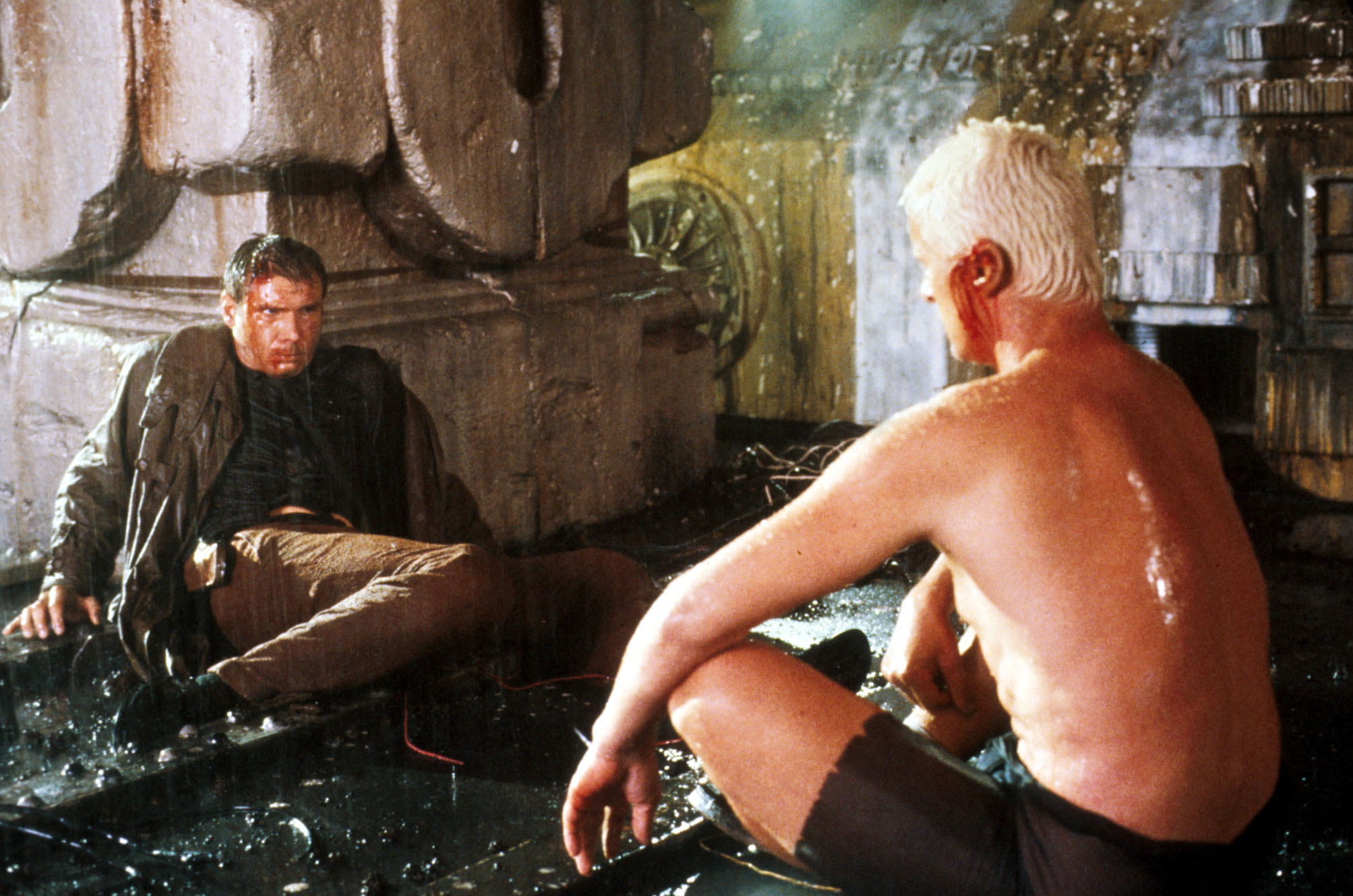 Deckard (Harrison Ford) and Replicant Roy Batty (Rutger Hauer) in the Ridley Scott film Blade Runner